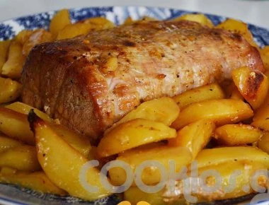 Η συνταγή της ημέρας: Μπούτι χοιρινό με πορτοκάλι και πατάτες